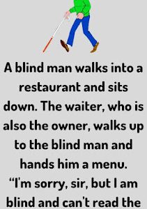 A blind man walks into a restaurant and sits down.